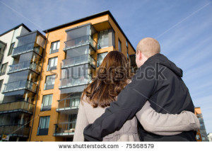 stock-photo-young-couple-dreaming-of-a-new-home-75568579